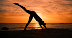 Fitness, yoga and silhouette of woman at sunrise on beach for exercise, training and pilates workout. Morning, meditation and shadow of girl balance by ocean for sports, wellness and stretching legs