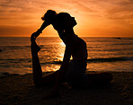Pilates, yoga and silhouette of woman on beach at sunrise for exercise, training and fitness workout. Motivation, meditation and shadow of girl balance by ocean for sports, wellness and stretching