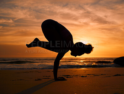 Buy stock photo Yoga, silhouette or crows pose on sunset beach, ocean or sea for evening exercise, workout or relax training. Yogi, woman or balance on sand at sunrise for fitness, healthcare wellness or strong body