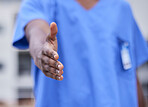 Doctor, handshake or black woman medical worker greeting, welcome or shaking hands in hospital, office or clinic. Trust, partnership or nurse for support, help or onboarding team deal and thank you.