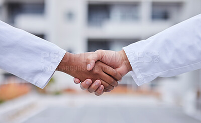 Buy stock photo Handshake, b2b meeting and doctors shaking hands for success collaboration, teamwork and medicine partnership. Thank you, welcome and medical support from startup company employee at hospital lobby
