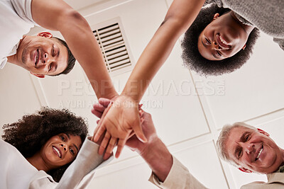 Buy stock photo Team building, hands or business people in a huddle with motivation, goals or strategy for a mission. Low angle, partnership or happy group of workers planning to work together in an office meeting