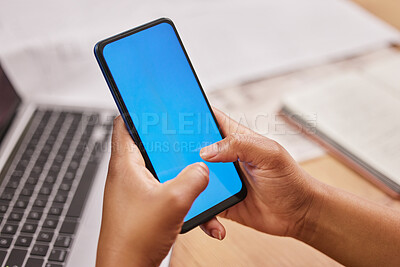 Buy stock photo Person, hands and phone typing on mockup for advertising, marketing or communication at the office desk. Hand of employee on mobile smartphone with blue screen display or chromakey for advertisement