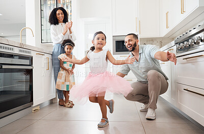 Buy stock photo Dance, princess and family with children in home kitchen for love, care and fun bonding together, clapping or celebration. Support, dancing and Mexico girl or kid with parents or mother and father