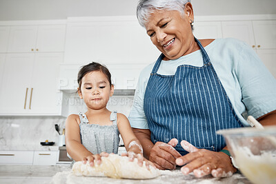 Buy stock photo Learning, cooking dough and grandmother with girl in kitchen baking dessert or pastry. Education, family care and happy grandma teaching kid how to bake, bonding and enjoying quality time together.