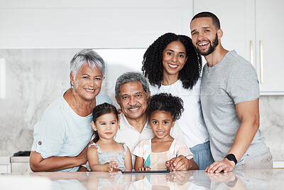 Buy stock photo Big family, portrait and smile in a kitchen with grandparents, children and parents at home. Mom, kids and senior people together with happiness, love and parent care in a house feeling happy