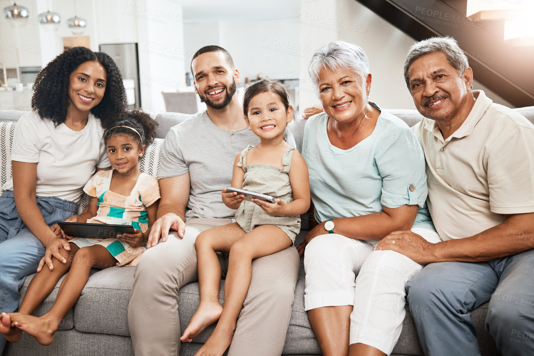 Buy stock photo Big family, portrait smile and on living room sofa relaxing together for fun holiday break or weekend at home. Happy grandparents, parents and children smiling in happiness for bonding time on couch