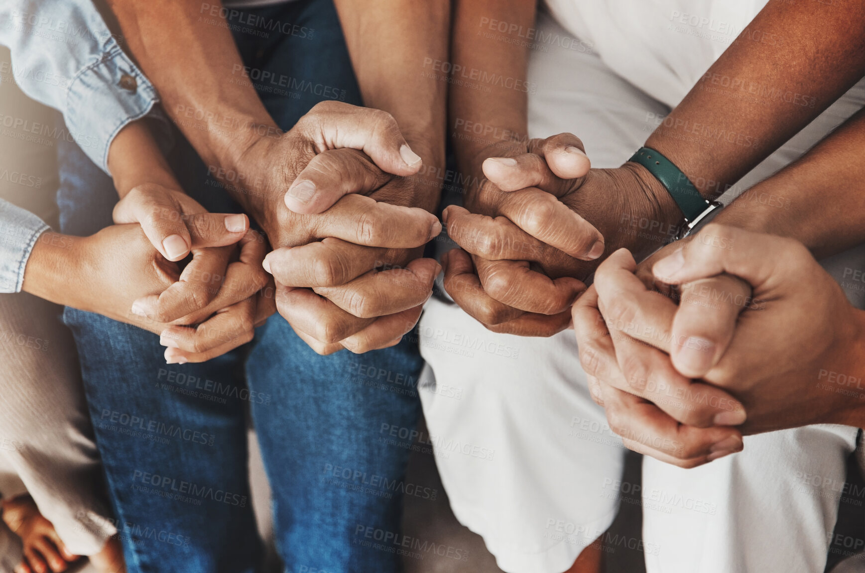 Buy stock photo Family, hands and prayer in home for love, support and faith or hope in house. Praying religion, worship and group of people pray to God, holy spirit or Jesus for peace, praise and spiritual wellness