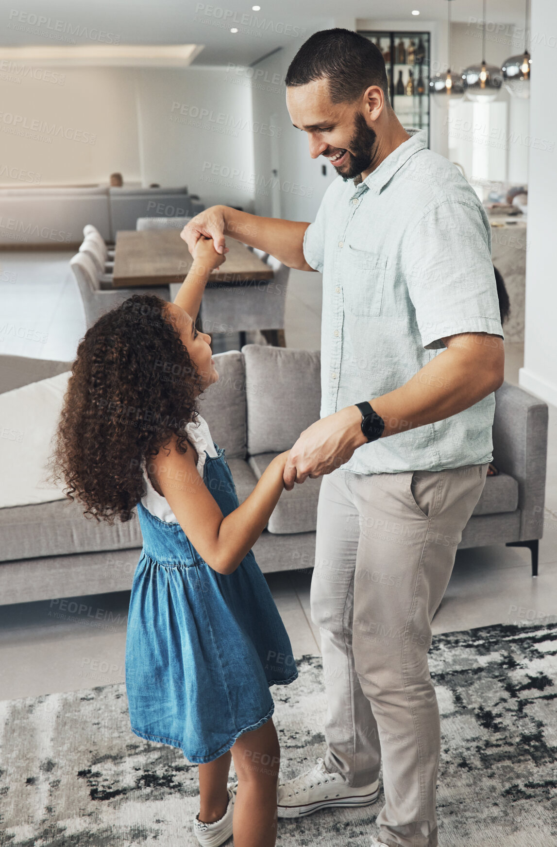 Buy stock photo Music, love and father dance with girl in living room for playing, bonding and having fun in their home. Podcast, happy family and man with daughter in lounge for dancing, happy and smile on weekend