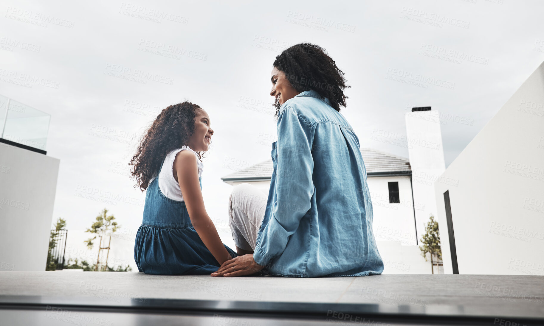 Buy stock photo Love, mother and girl outdoor, talking and quality time on weekend, break and loving together. Child development, mama and female kid chatting, outside and conversation for fun, playful and cheerful