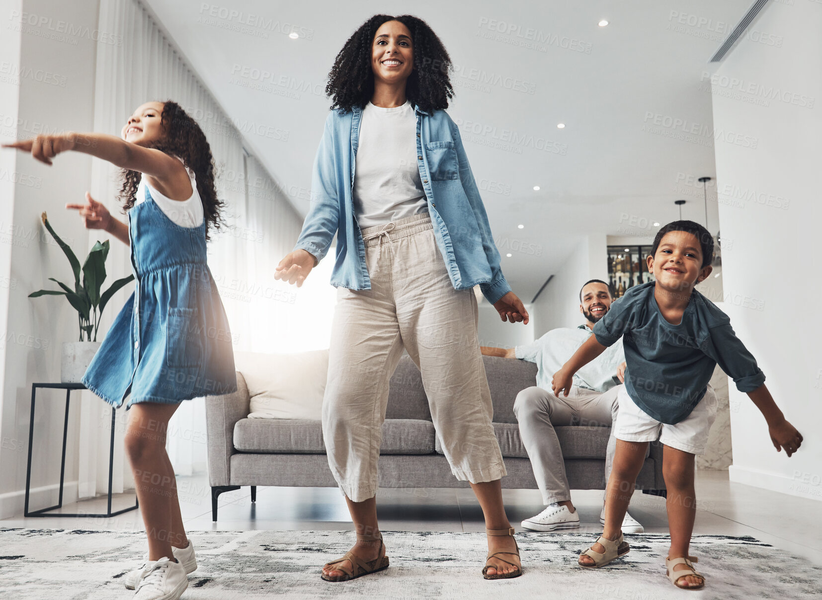 Buy stock photo Happy family, fun and dance in a living room by mother and children playing, bonding and happy in their home. Kids, parents and dancing game in a lounge on a weekend, cheerful and happiness together