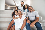 Love, stairs and group portrait of happy family bonding, hug and enjoy quality time together in Rio de Janeiro Brazil. Smile, happiness and relax children, parents and grandparents in vacation home