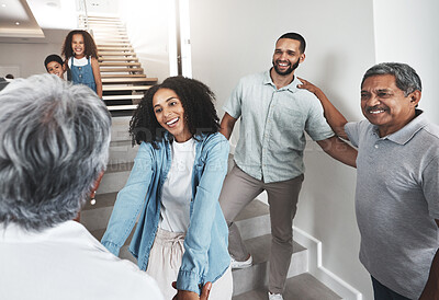 Buy stock photo Black family, welcome and senior parents in home with holding hands, smile and happiness on stairs. African people, children and women on steps together with excited solidarity, support and care