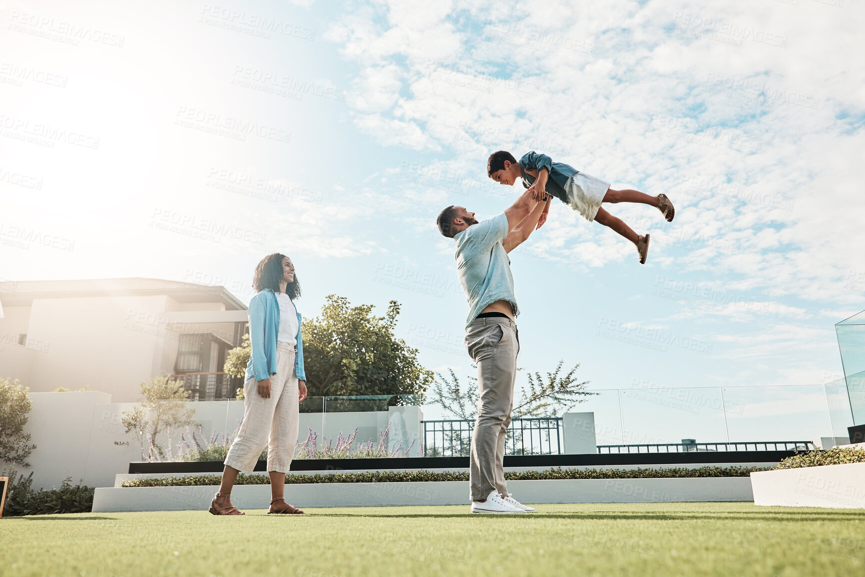 Buy stock photo Playground, park and family outdoor in nature on a summer day on holiday with mom, dad and child. Play, fun and freedom of a mother, man and kid in the air together with love and parent care 