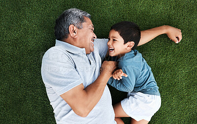 Buy stock photo Playful, laughing and grandfather and child in a garden for happiness, playing and cheerful together. Babysit, happy and senior man with a boy kid for quality time during a fun visit on grass