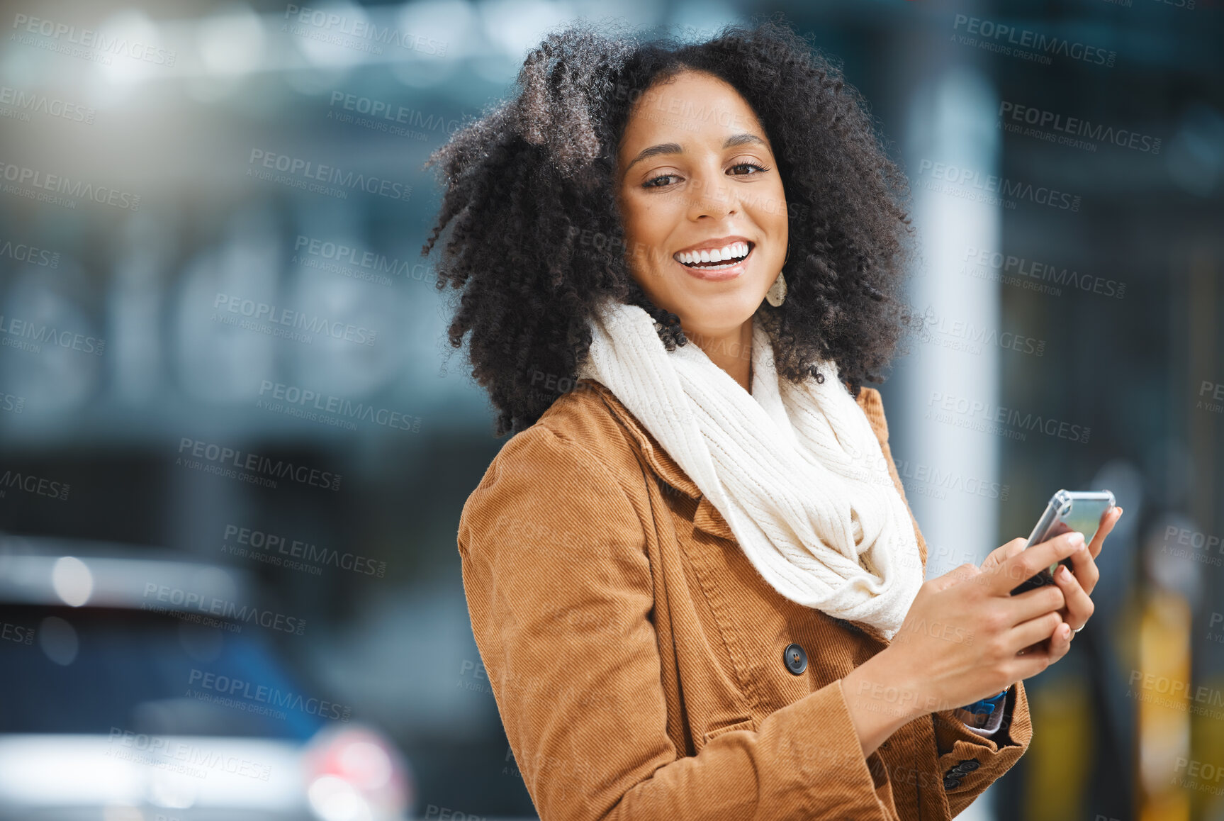 Buy stock photo Cellphone, street and portrait of a black woman in the city networking on social media, mobile app or internet. Happiness, smile and African female typing text message on a phone and walking in town.