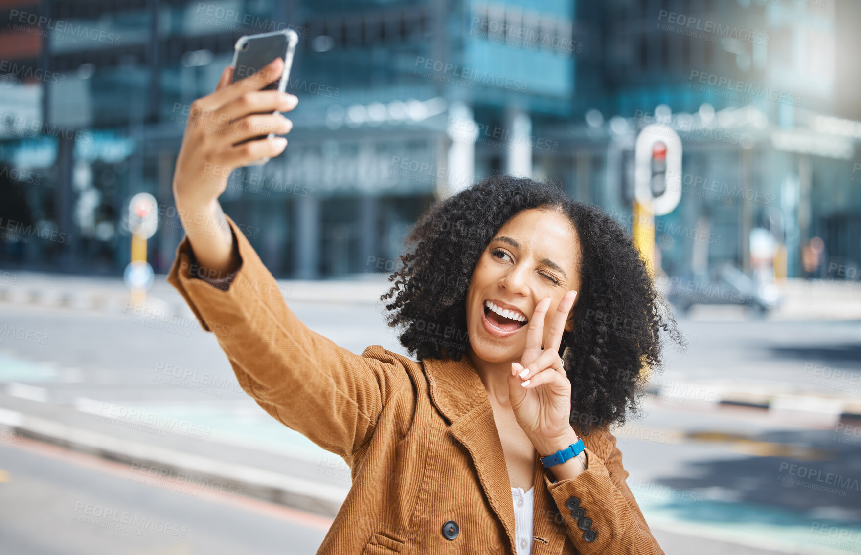 Buy stock photo Selfie, peace sign and funny woman in city for travel fun, vacation and social media update. Comic, smile and goofy influencer in the street with a hand emoji live streaming on a mobile in France