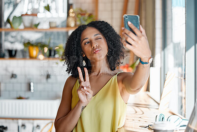 Buy stock photo Black woman, cafe and selfie with peace sign, hands and relax for social media, app or profile picture. Young gen z girl, student and coffee shop with smartphone app, photo and happiness in morning