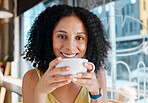 Happy black woman, portrait and relax in coffee shop, restaurant or bistro for lunch, latte and smile. Face, cafe and young female enjoy cup of tea drink, cappuccino and break alone with happiness