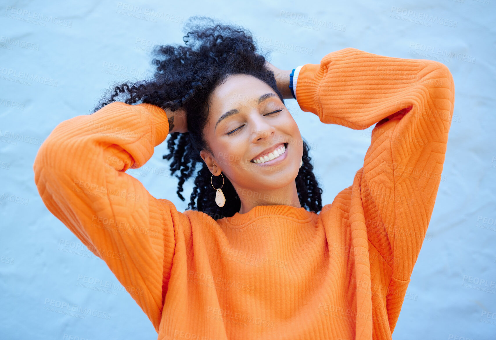 Buy stock photo Happy, fashion and face of black woman on blue background with smile, confident mindset and freedom. Happiness, beauty and girl relax in city with urban style, trendy and stylish clothes on weekend