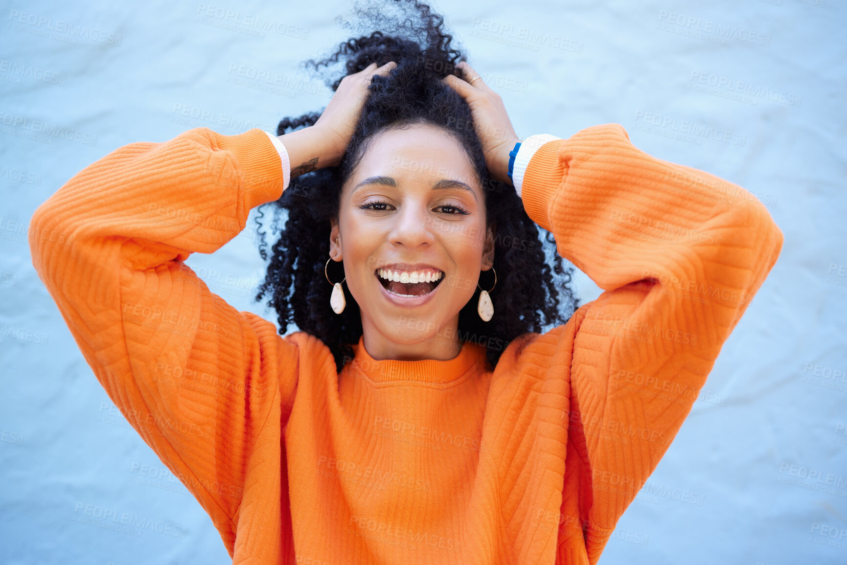 Buy stock photo Black woman, portrait or touching fashion hairstyle on isolated blue background, mockup backdrop or wall mock up. Smile, happy or dancing student in trendy, cool or stylish clothes for youth freedom