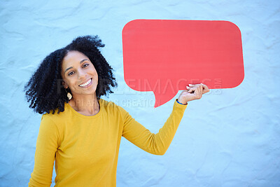 Buy stock photo Black woman, portrait and speech bubble in studio for advertising, mockup and space on blue background. Social media, girl and billboard, branding and copy for product placement and marketing