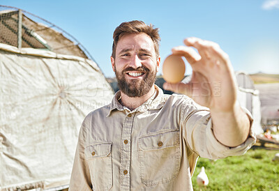 Buy stock photo Farm, agriculture and portrait of farmer with egg for inspection, growth production and food industry. Poultry farming, organic and man with chicken eggs for order, protein market and quality control