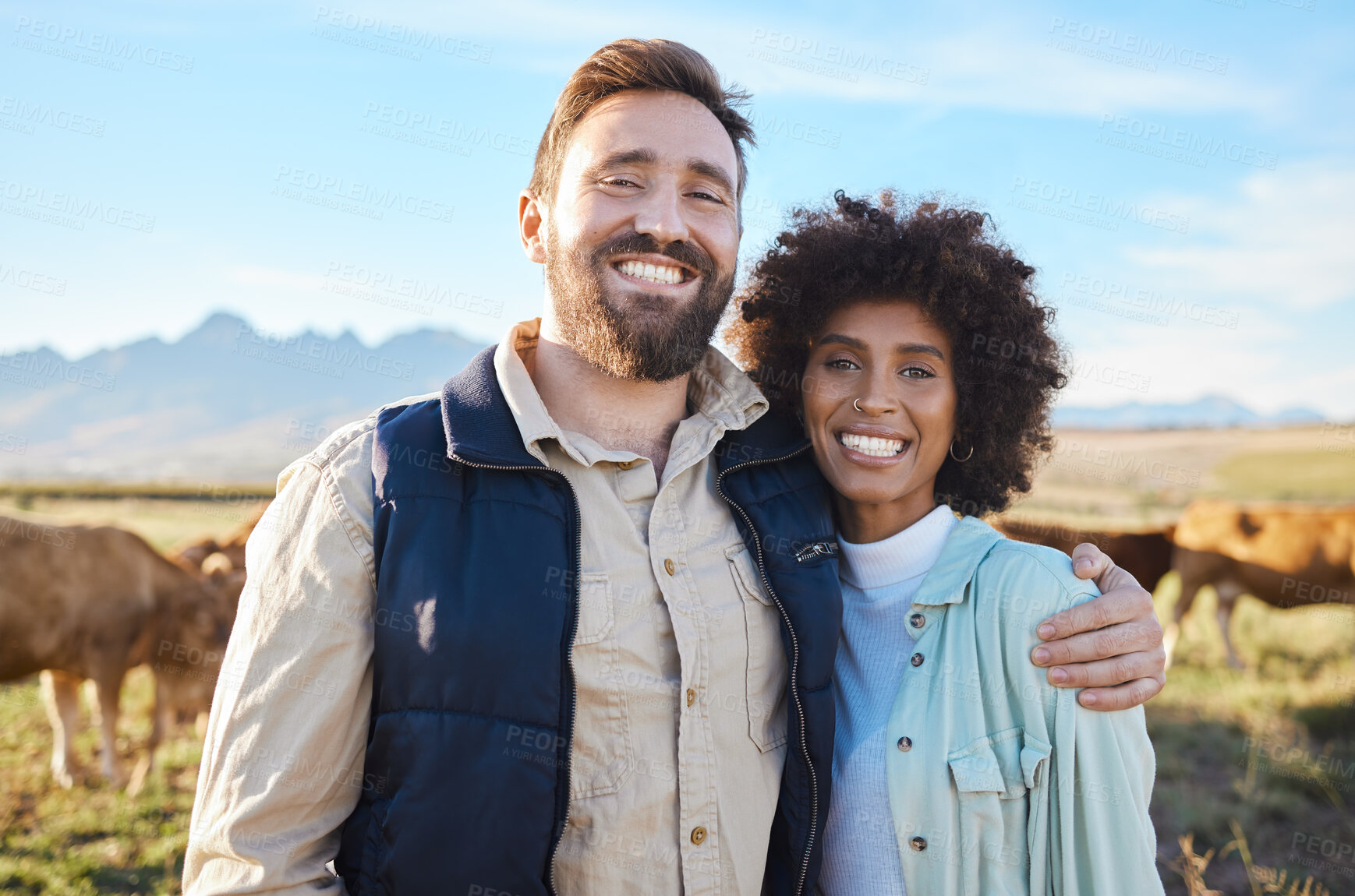 Buy stock photo Love, cow and portrait of interracial couple on farm for agriculture, livestock and growth. Teamwork, cattle and hug with man and black woman in grass field for sustainability, health or environment 