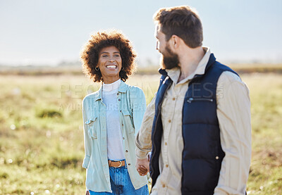 Buy stock photo Love, relax and holding hands with interracial couple on farm for agriculture, peace and growth. Trust, nature and hug with man and black woman in grass field for sustainability, agro and environment