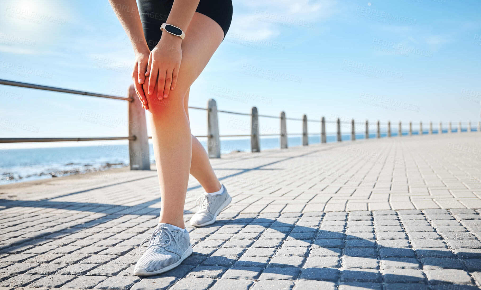 Buy stock photo Sports athlete, knee pain or red glow by beach fitness, ocean workout or sea training in healthcare wellness crisis. Legs injury, hurt or body stress for woman in abstract burnout on medical anatomy