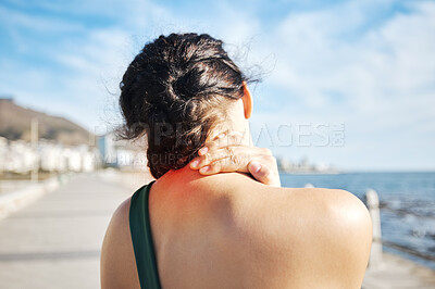 Buy stock photo Fitness, beach or sports woman with neck pain after exercising, body training injury or outdoor workout. Red glow, back view or injured girl runner suffering from muscle tendon after running exercise