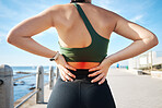 Back pain, red fitness and woman at beach exercise or sports injury, emergency and healthcare risk. Medical, spine and athlete or person with anatomy problem for training, cardio, or running workout