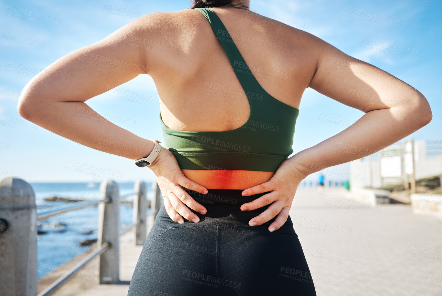 Buy stock photo Back pain, red fitness and woman at beach exercise or sports injury, emergency and healthcare risk. Medical, spine and athlete or person with anatomy problem for training, cardio, or running workout