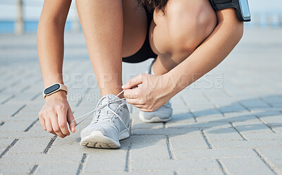 Buy stock photo Shoe lace, fitness and woman outdoor, exercise and training for competition, health and wellness. Ready, female athlete and runner with sneakers, tying laces or workout for practice, energy or cardio
