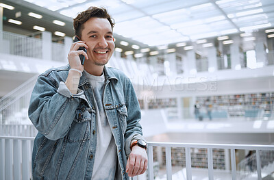 Buy stock photo Man, phone call and portrait for a happy conversation in a library building with positive mindset. Young gen z person or college student with smartphone for communication, talking and happiness