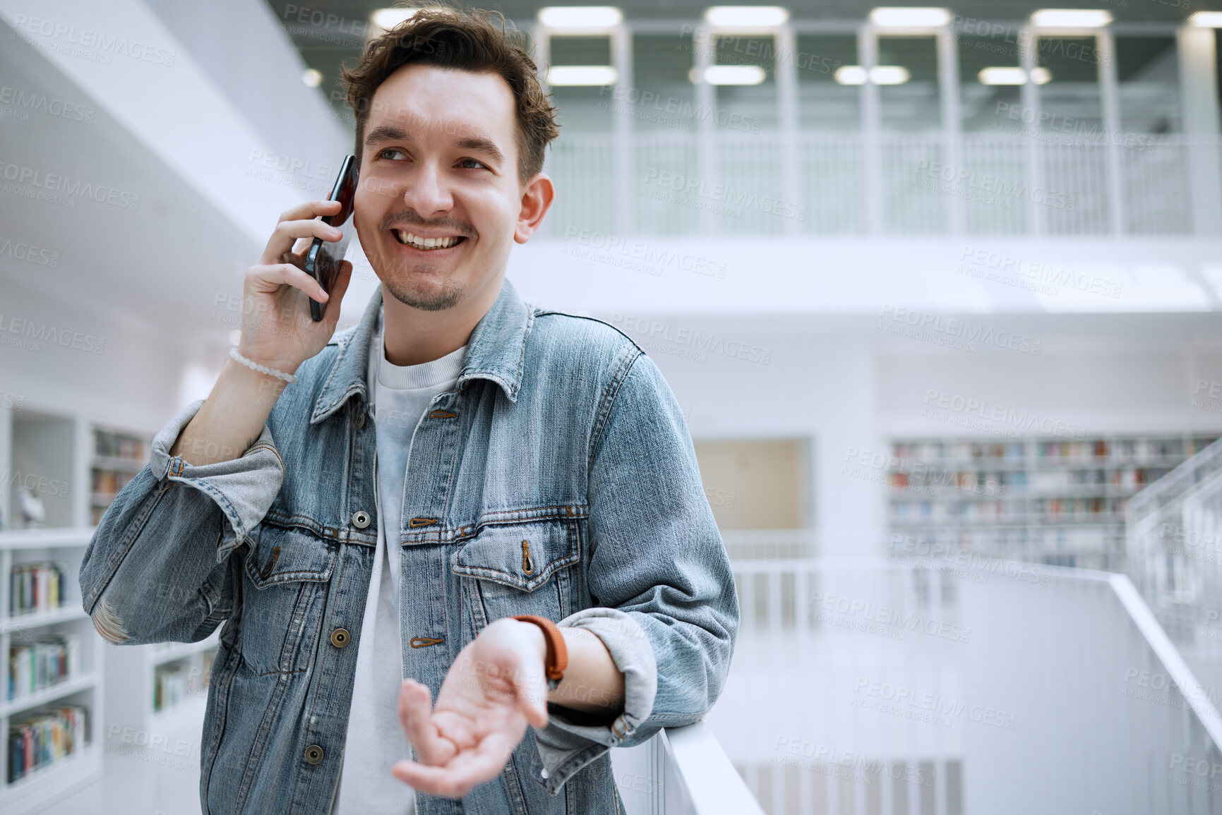 Buy stock photo Man, phone call and communication at library for conversation, discussion or advice. Happy male with smile talking on mobile smartphone in big book store or study for decision making, choice or idea