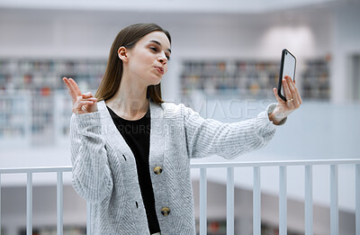 Buy stock photo Selfie, library and woman with peace sign for social media, influencer blog post or studying update for gen z lifestyle. Emoji hands person or student profile picture in university, campus or college