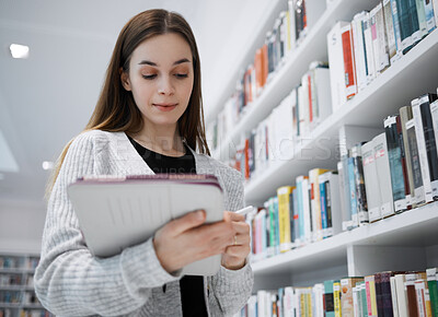 Buy stock photo University, writing or woman in library with tablet for research, education or learning. Bookshelf, books or girl student on tech for scholarship search or planning school project at collage campus
