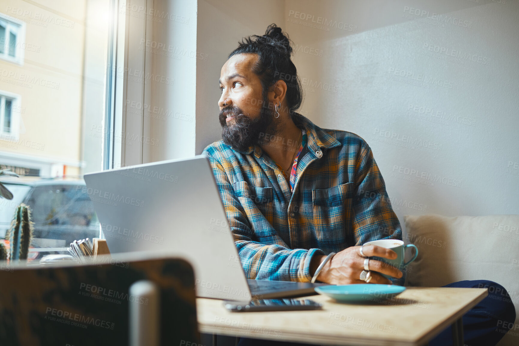 Buy stock photo Laptop, coffee and man in a cafe working on a creative freelance project or small business strategy. Cafeteria, computer and male freelancer doing remote work while drinking a latte in a restaurant.