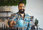 Cafe, portrait and man barista with a coffee for a customer in his small business restaurant. Happy, smile and male waiter or server giving a cup of cappucino, latte or espresso in his cafeteria shop