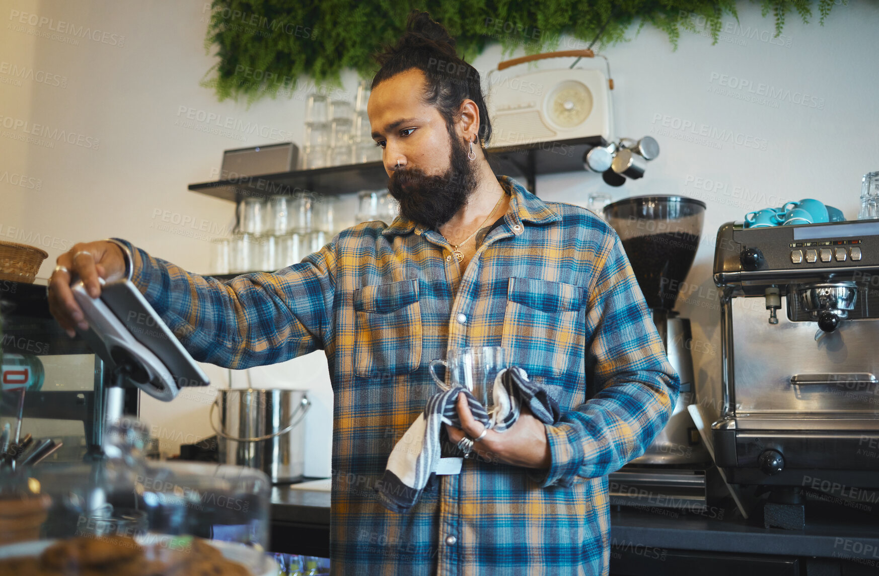 Buy stock photo Coffee, tablet and barista reading orders, checklist or inventory online while working at a cafe. Service, morning and man with technology ordering supplies, product and connection with supplier