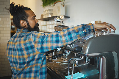 Buy stock photo Man in cafe, barista and machine for drink with focus and small business, workflow and process. Clean up are espresso, latte or cappuccino production, coffee shop with hygiene and disinfection