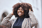 Black woman, portrait smile and afro hairstyle for fashion in city travel, trip or outdoor journey. Happy African American female touching stylish curls and smiling in happiness for traveling in town