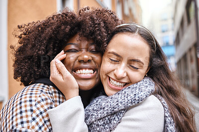 Buy stock photo Women, friends and hug on street in city with smile, happiness and solidarity by blurred background. Young african lesbian, happy couple and embrace with love, romance and valentines day adventure