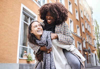 Buy stock photo Girl friends, laughing and city travel adventure of young people with a piggyback and happiness. Freedom, diversity and women smile outdoor feeling happy on a walk on a urban holiday together