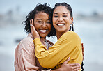 Lesbian, hug and portrait of couple of friends for lgbtq or queer love and freedom on vacation together at the beach. Black woman and partner on a date, fun and excited for valentines holiday by sea
