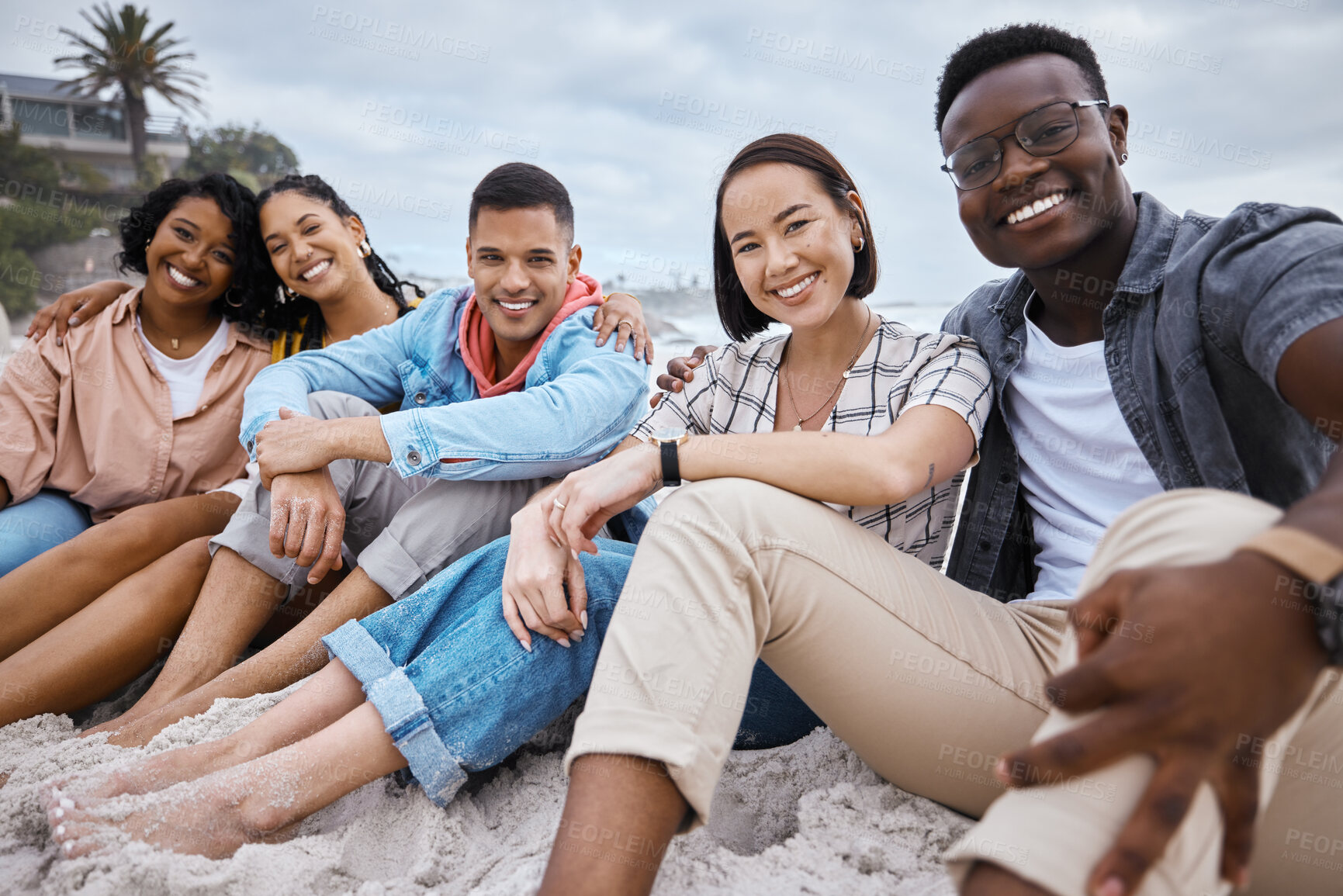 Buy stock photo Friends, group and portrait at beach, sand and outdoor nature for fun, happiness and travel. Diversity of happy young people at sea, ocean holiday and vacation with smile of relaxing weekend together
