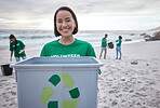 Recycling bin, portrait of Asian woman and volunteer at beach cleaning for environmental sustainability. Recycle, earth day and smile of happy female ready to stop pollution by ocean or seashore.