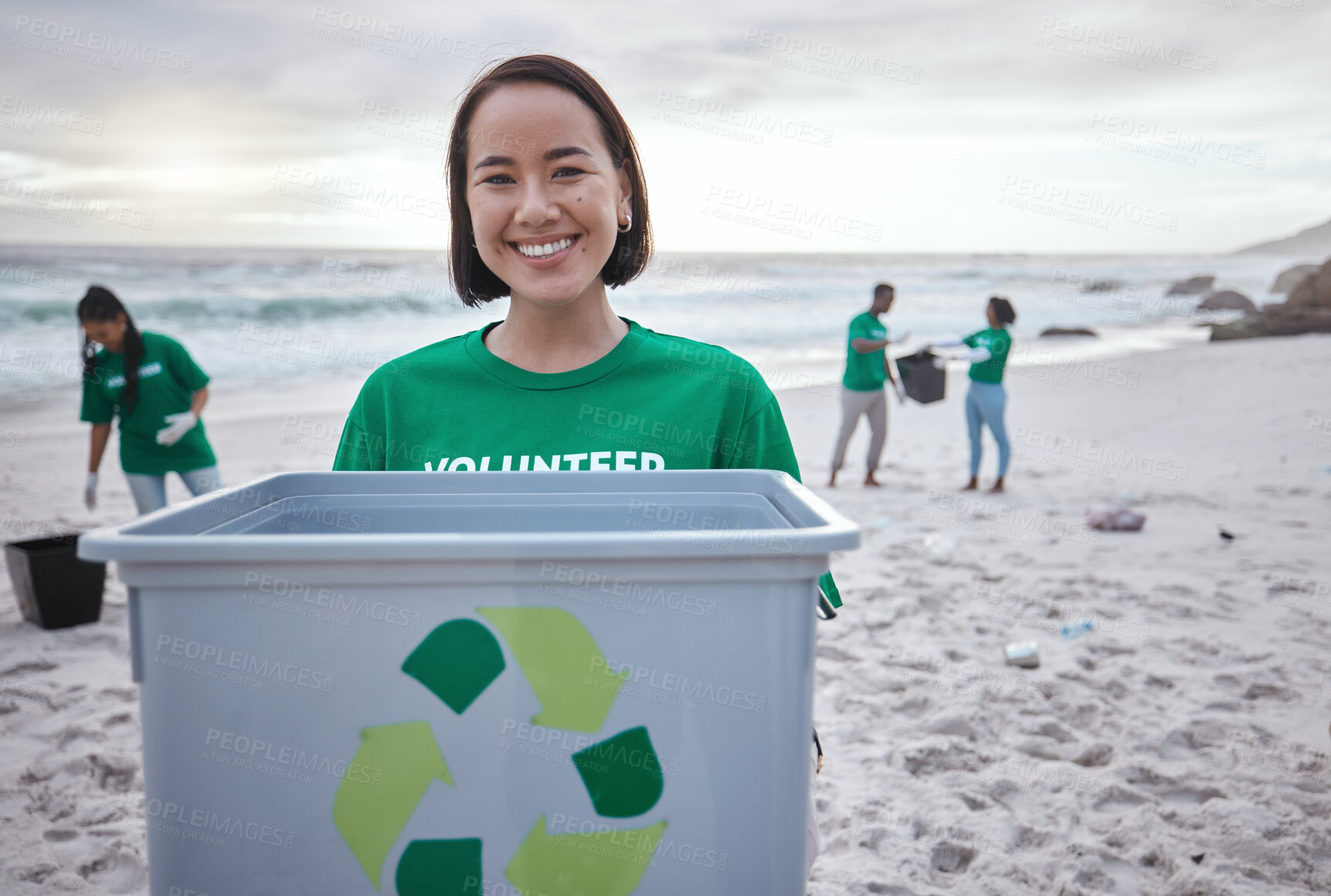 Buy stock photo Recycling bin, portrait of Asian woman and volunteer at beach cleaning for environmental sustainability. Recycle, earth day and happy female ready to stop pollution by ocean  for community service.