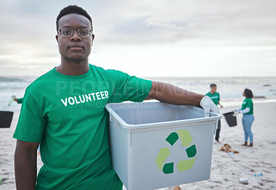 Buy stock photo Cleaning, recycling and portrait of black man on beach for sustainability, environment or eco friendly. Climate change, earth day or nature with volunteer and plastic for charity or community service